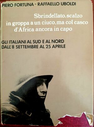 Sbrindellato, scalzo in groppa a un ciuco, ma col casco d’Africa ancora in capo